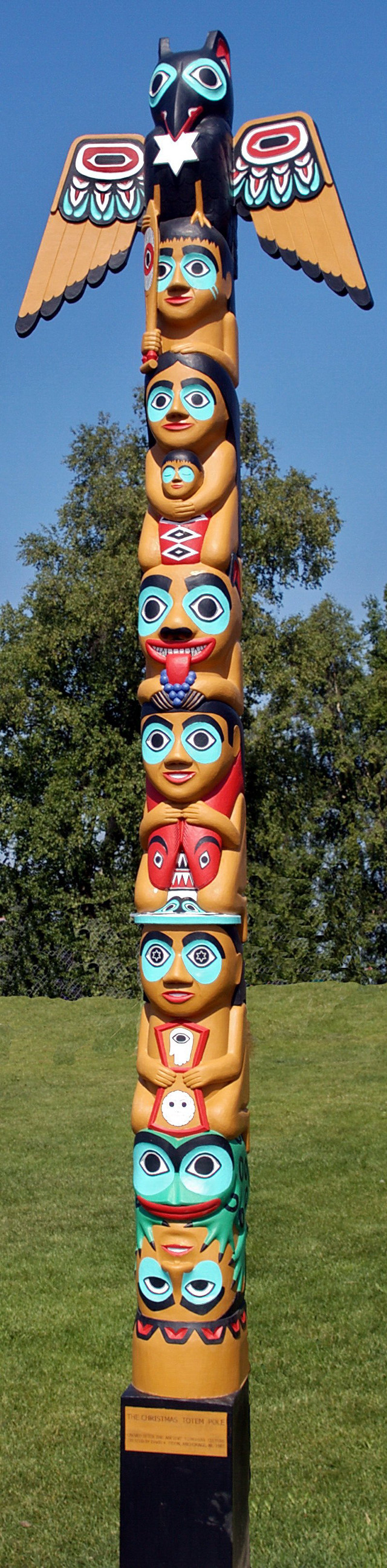 Tall sculpture bird colorful wings free wallpaper - medium preview image