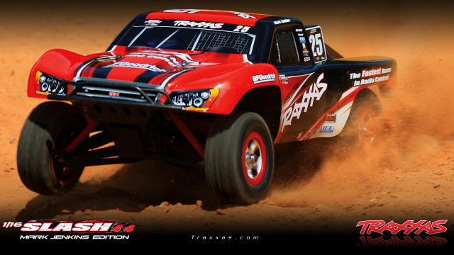 Red truck driving dirt desert free wallpaper - medium preview image