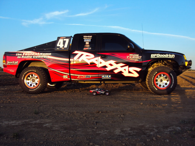 Truck decals parked field sky free wallpaper - medium preview image