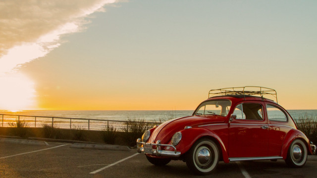 Red car parking lot ocean #3 free wallpaper - medium preview image