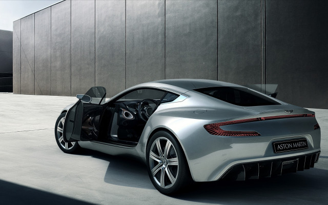 Silver sports car parked building #2 free wallpaper - medium preview image