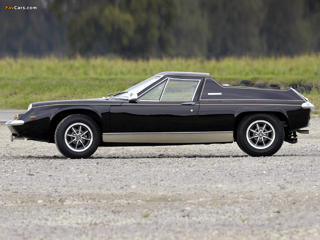 Black car gravel road grass free wallpaper - medium preview image