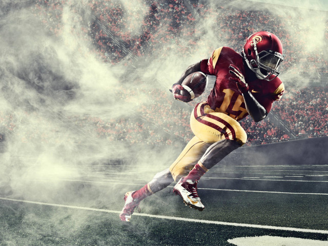 Football player running smoke crowd #2 free wallpaper - medium preview image