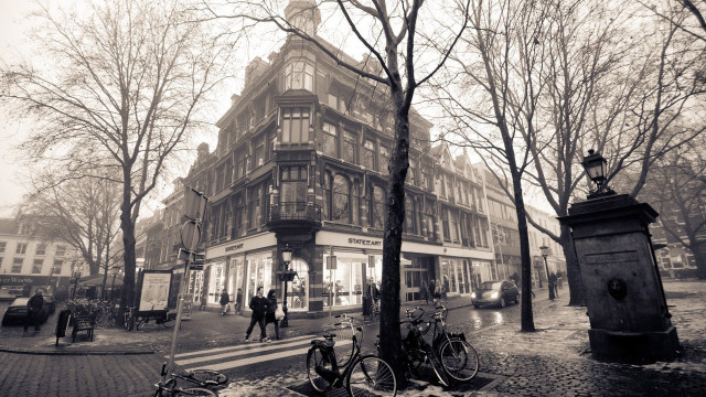 Black white building bicycles people free wallpaper - medium preview image