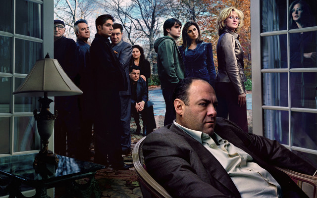 Man sitting chair group people free wallpaper - medium preview image