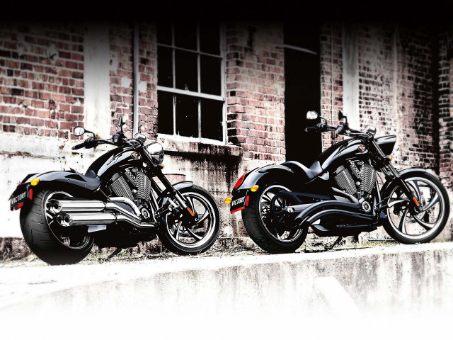 Motorcycles parked brick building window free wallpaper - medium preview image
