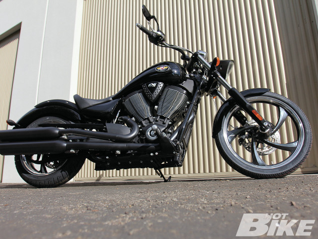 Black motorcycle metal door building free wallpaper - medium preview image