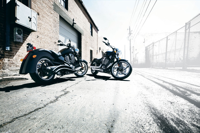 Two motorcycles street building fence free wallpaper - medium preview image