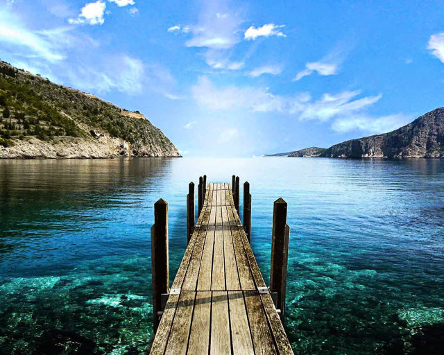 Wooden dock ocean mountains sunny free wallpaper - medium preview image