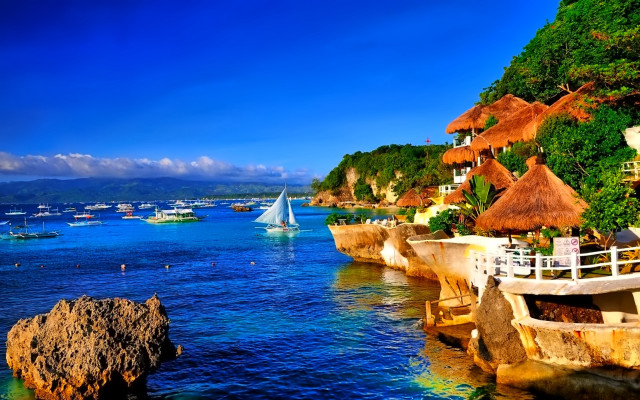 Beach boats hill blue sky free wallpaper - medium preview image