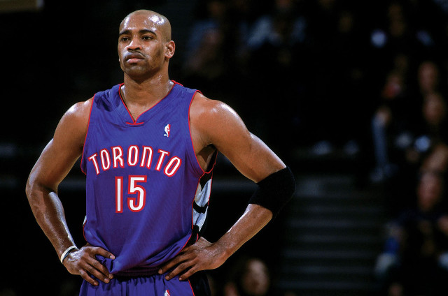 Man standing crowd purple uniform free wallpaper - medium preview image