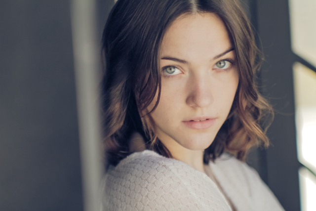 Woman blue eyes serious look #2 free wallpaper - medium preview image