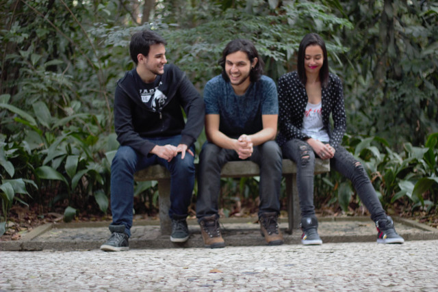 Three people bench forest smiling free wallpaper - medium preview image