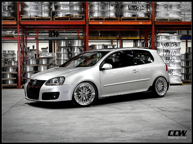 White car garage metal cans free wallpaper - medium preview image