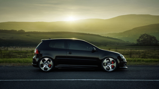 Black car sunset mountains field #2 free wallpaper - medium preview image
