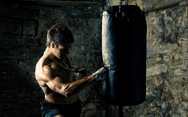Man boxing stone room punching #2 free wallpaper - medium preview image