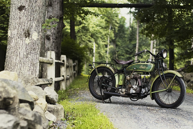 Motorcycle parked road tree fence free wallpaper - medium preview image