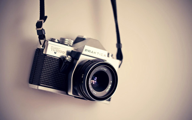 Camera hanging wall black strap #2 free wallpaper - medium preview image