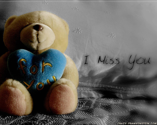 Teddy bear holding heart i free wallpaper - medium preview image
