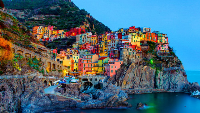 Village cliff ocean dusk boat free wallpaper - medium preview image