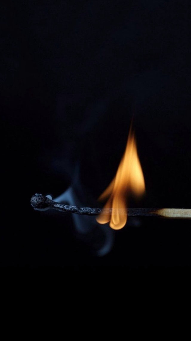 Matchstick lit flame dark lighting free wallpaper - medium preview image