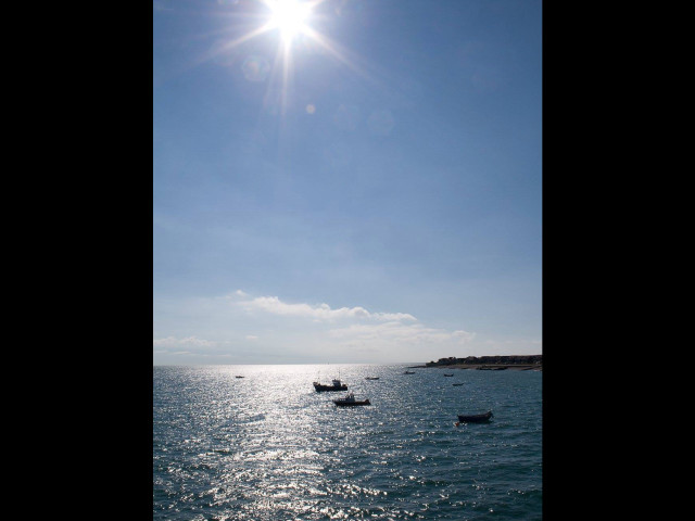 Boats floating water blue sky free wallpaper - medium preview image