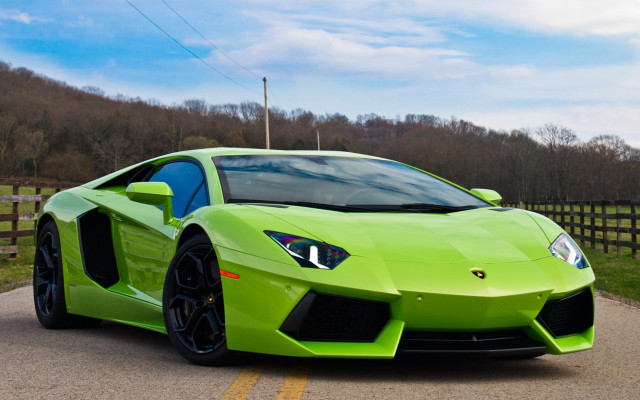 Green sports car parked road free wallpaper - medium preview image