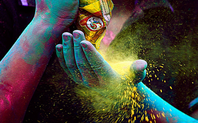 Colored powder person holding bag free wallpaper - medium preview image
