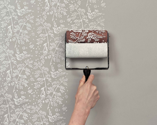 Person painting wall flower pattern free wallpaper - medium preview image