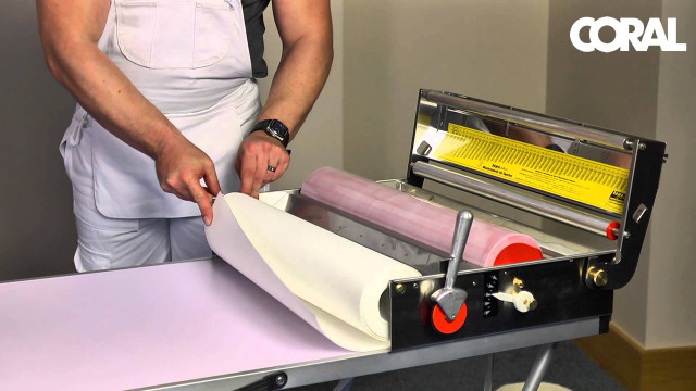 Man cutting paper machine yellow free wallpaper - medium preview image