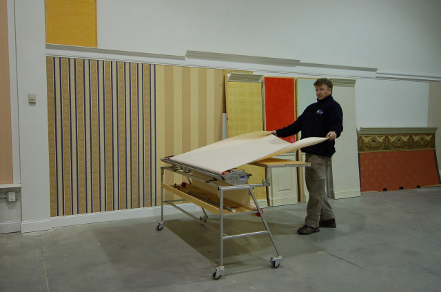 Man standing table paper striped free wallpaper - medium preview image