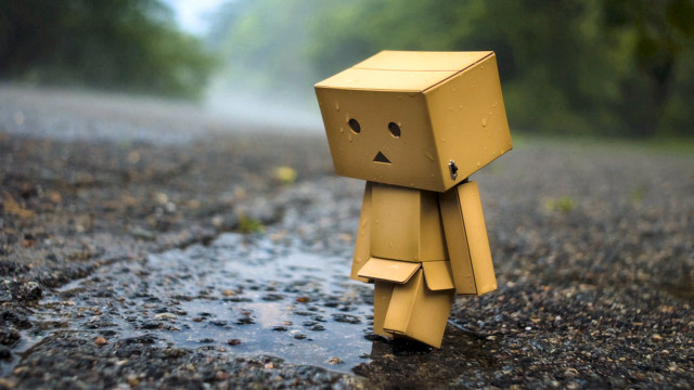 Cardboard toy sad face rainy free wallpaper - medium preview image