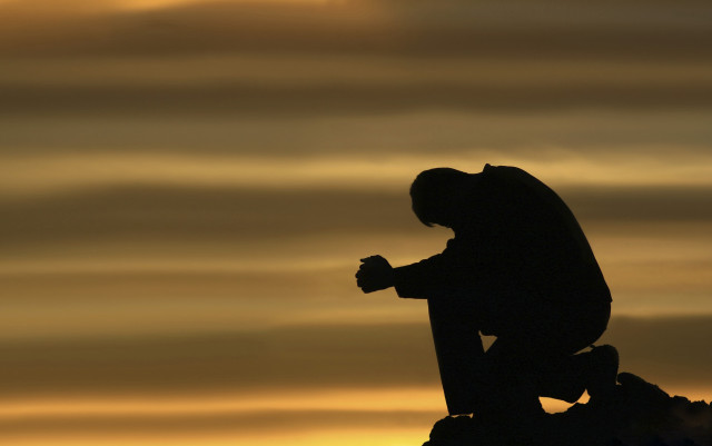 Statue man cross sunset sky free wallpaper - medium preview image