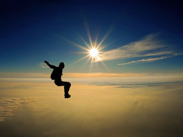 Man jumping high sky sun free wallpaper - medium preview image