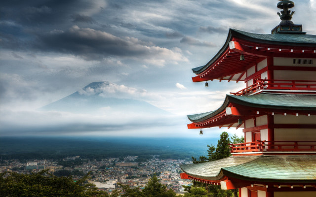 Tall red building mountain background free wallpaper - medium preview image