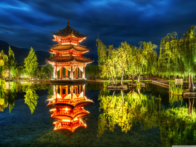 Pagoda lit night sky pond free wallpaper - medium preview image