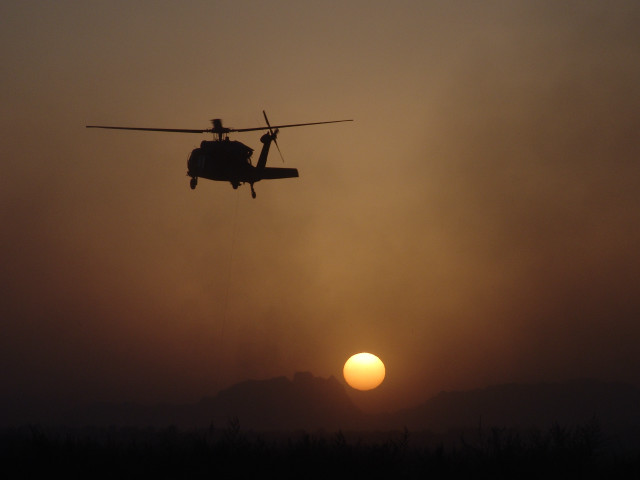 Helicopter sunset mountain flying sky free wallpaper - medium preview image