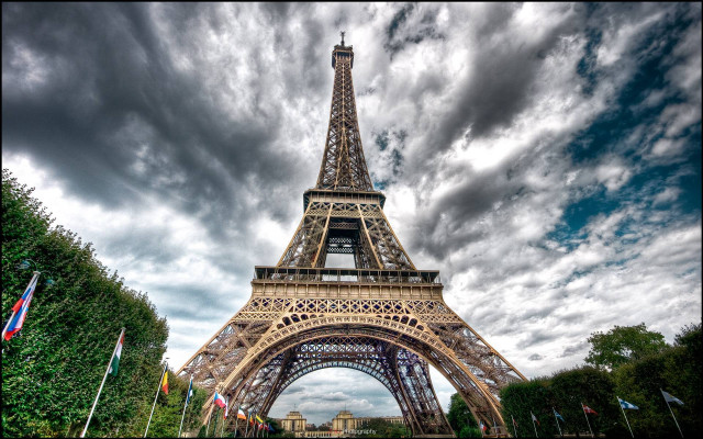 Tall tower sky above trees free wallpaper - medium preview image