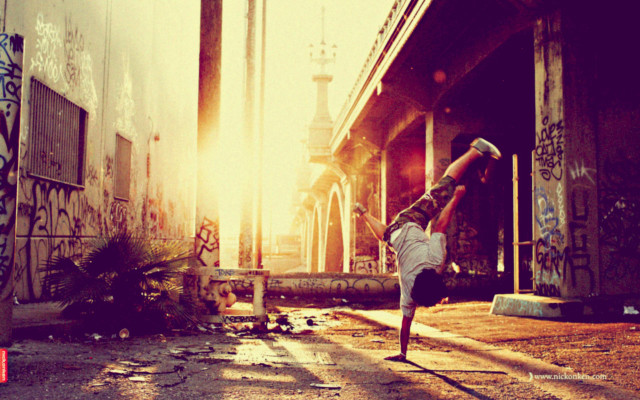 Man handstand alleyway graffiti building free wallpaper - medium preview image
