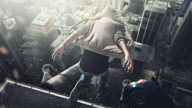 Man walking tall building hands free wallpaper - medium preview image