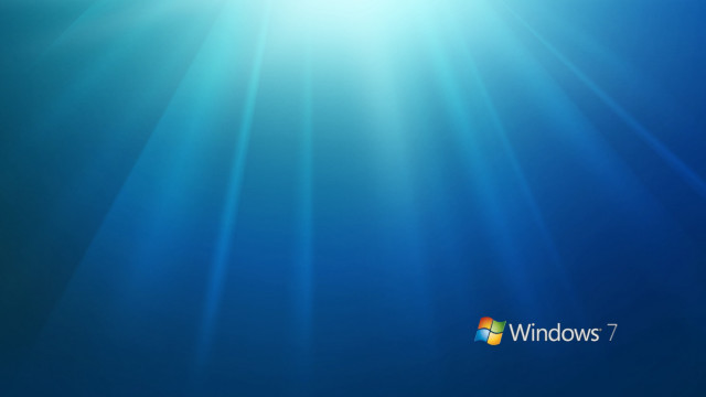 Blue background sunlight windows7 logo free wallpaper - medium preview image
