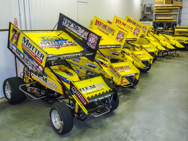 Yellow race cars garage white free wallpaper - medium preview image