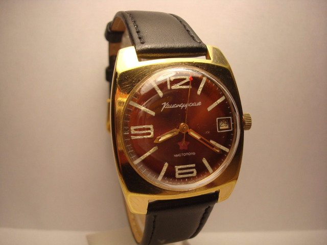 Watch red face gold hands free wallpaper - medium preview image