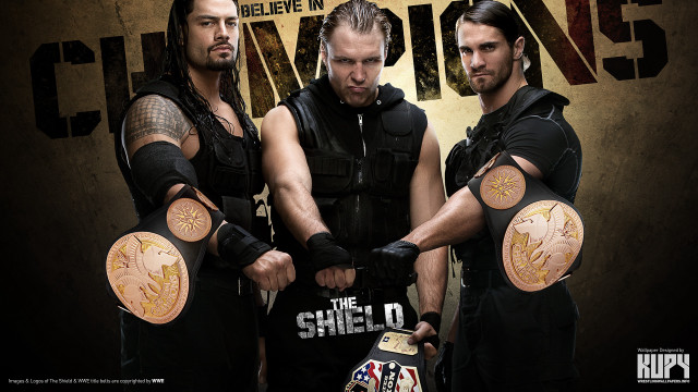 Three men black outfits holding free wallpaper - medium preview image