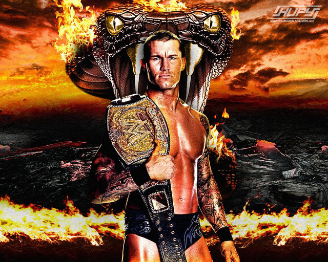 Man wrestling suit holding fire free wallpaper - medium preview image