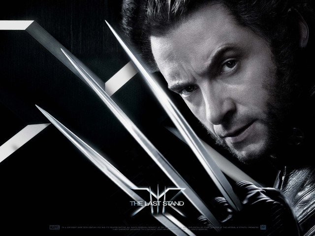 Man holding scissors movie poster free wallpaper - medium preview image