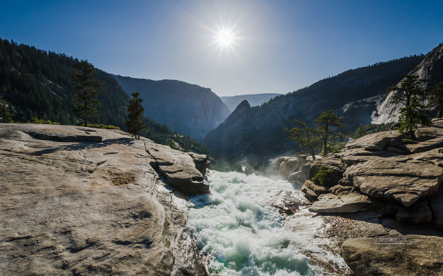 River rocks valley mountains sunlight free wallpaper - medium preview image
