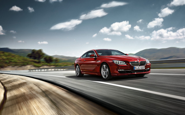 Red car driving road mountains free wallpaper - medium preview image