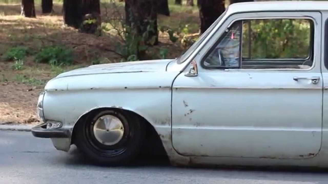 White car parked road forest #2 free wallpaper - medium preview image