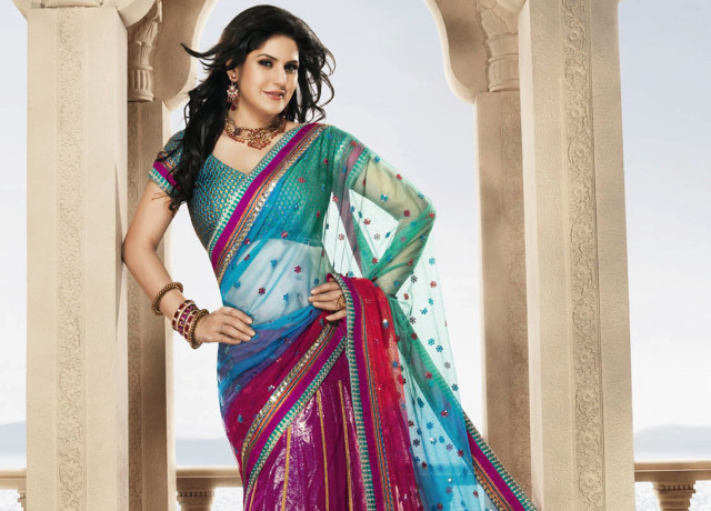 Woman sari doorway stone pillars free wallpaper - medium preview image